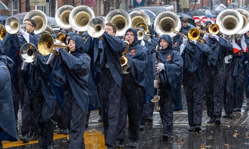 Students march in a Veterans Day Parade